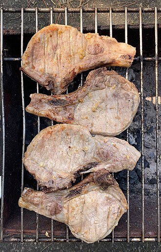 Pork, chop, lean and fat eaten