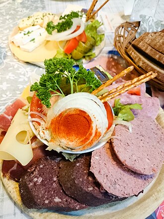 Sausage with tomato-based sauce