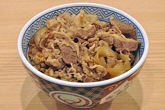 Beef, rice, and vegetables including carrots, broccoli, and/or dark-green leafy; soy-based sauce