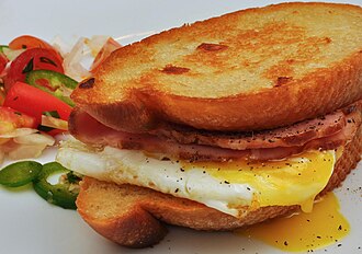 Egg sandwich on English muffin, with sausage