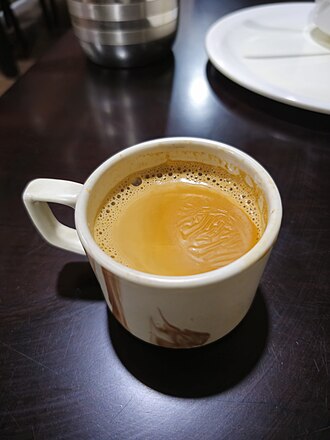 Tea, hot, with milk